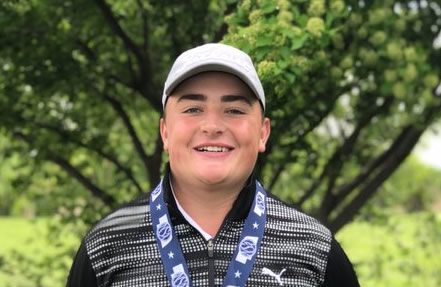 Luke Gutschewski 21 poses with his medal after winning the individual Class B state golf championship. Gutschewski was the first Knight ever to win the golf championship.