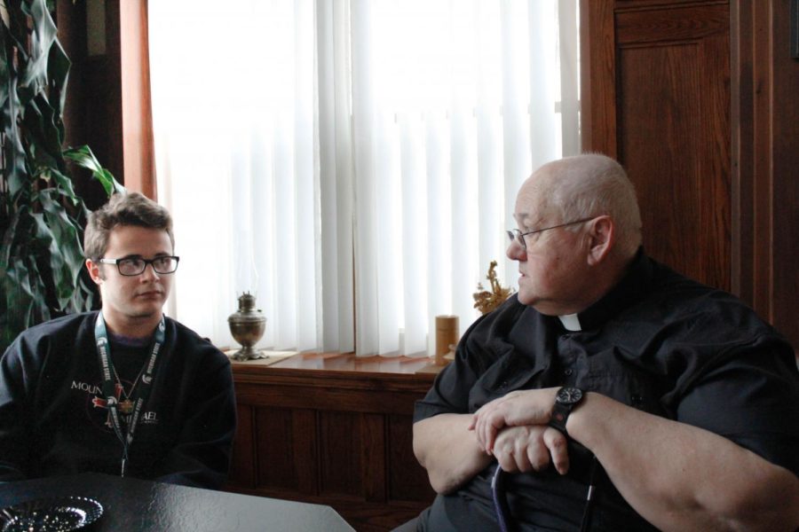 Talking with Ben Goetz 20, Fr. Richard Thell discusses the faith and how Goetz is doing in school. Fr. Richard passed away on Nov. 10, 2018.