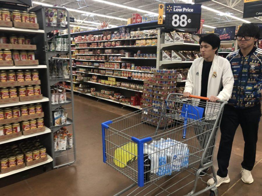 Ryan Choi 20 and Jae Shin 19 gather supplies for the upcoming week. Walmart trips allow boarders to stock up on necessities and spend time with classmates.