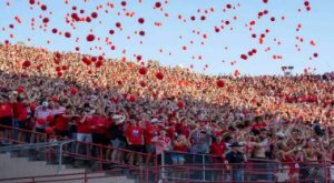 GBR! Nebraska- themed balloons are released by fans following the Huskers’ first touchdown. The  balloon release was heavily anticipated by fans despite envrionmental concerns. Photo courtesy of  Kaidence Donahue.