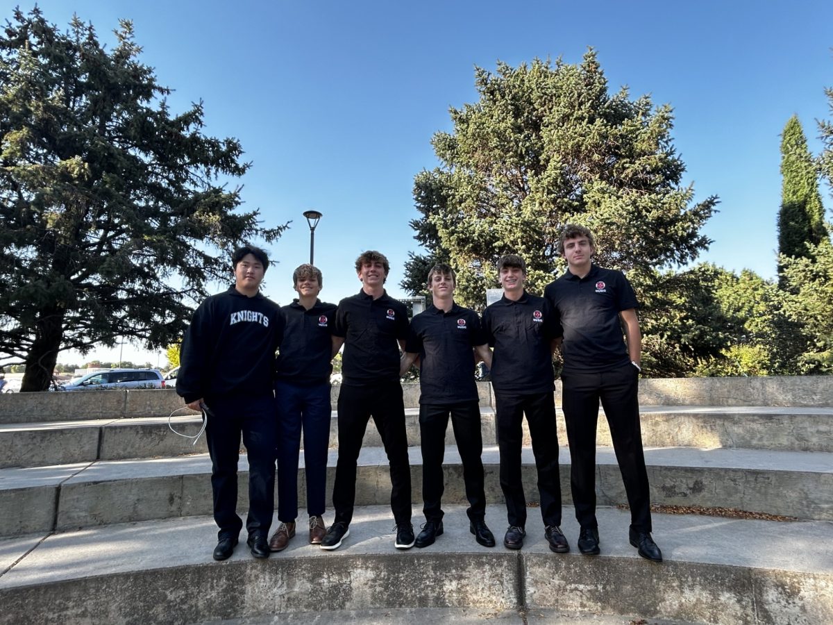 Pitch Perfect Eason Jia '28, Laeth Sykora '28, Peter Trautman '26, Brady Quinlivan '26, Jack Burke '27, and Luke Bittner '26 pose for a team photo before their choir festival. The team travelled to the University of Nebraska Kearny for the event. Photo courtesy of Ms. Emily Nolan.